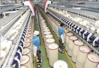 瀚海绿洲 绽放异彩 巴音郭楞纺织技术开发新篇章